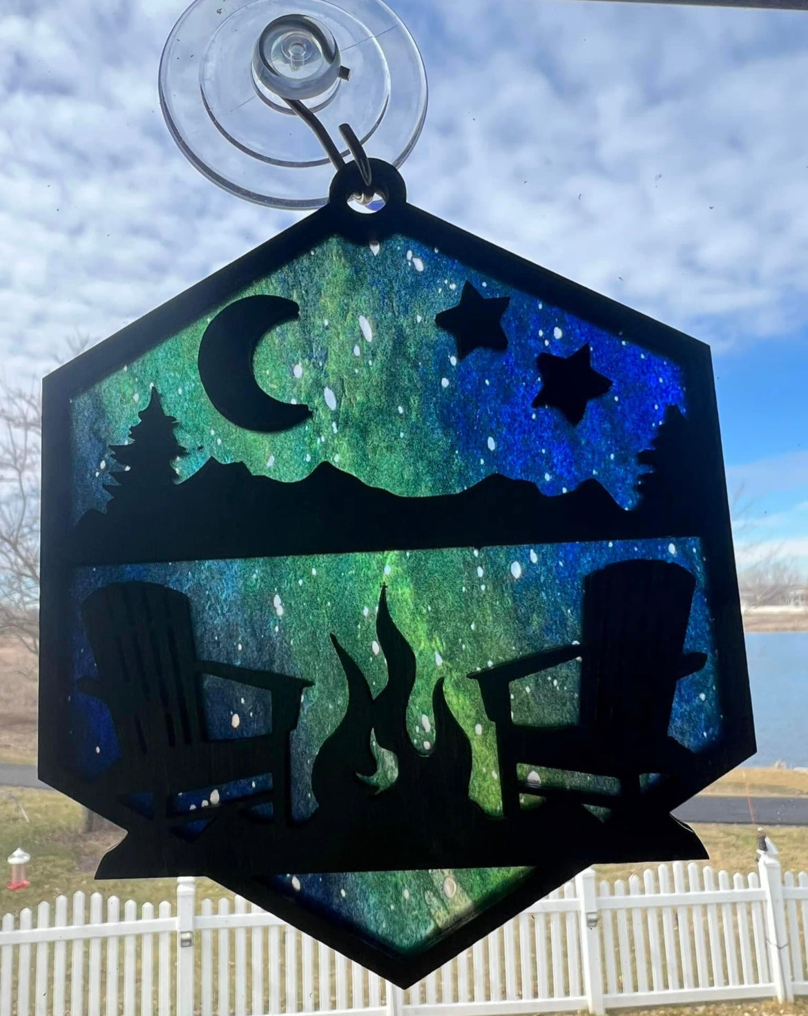 Mountain or lake chair view suncatcher