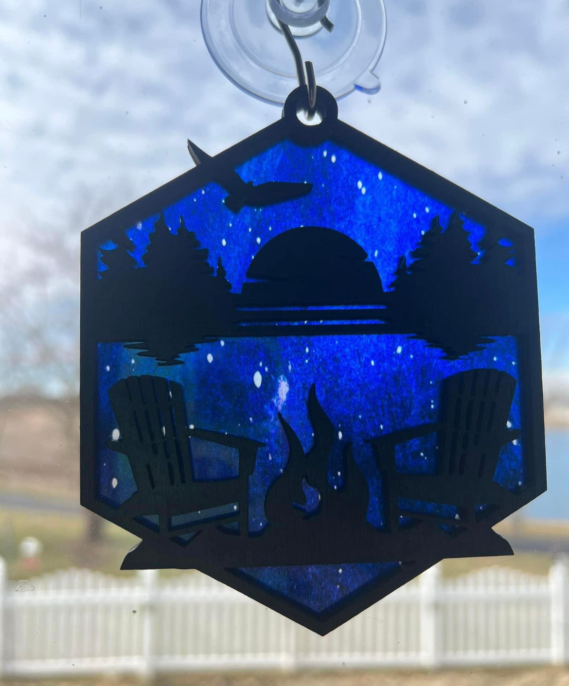 Mountain or lake chair view suncatcher